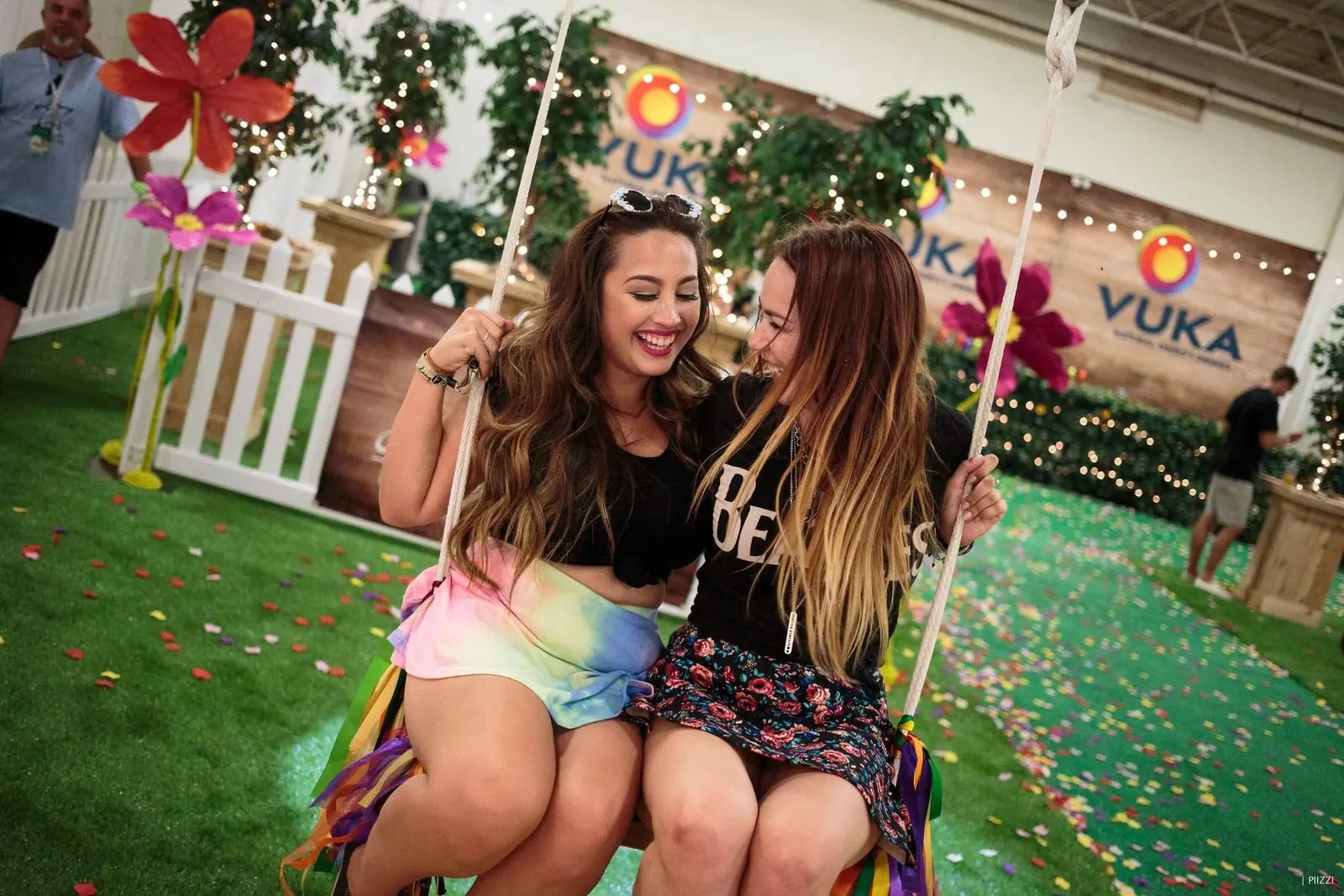 Two festivalgoers on the giant swing in the Vuka Magic Charging Garden at KAABOO Del Mar